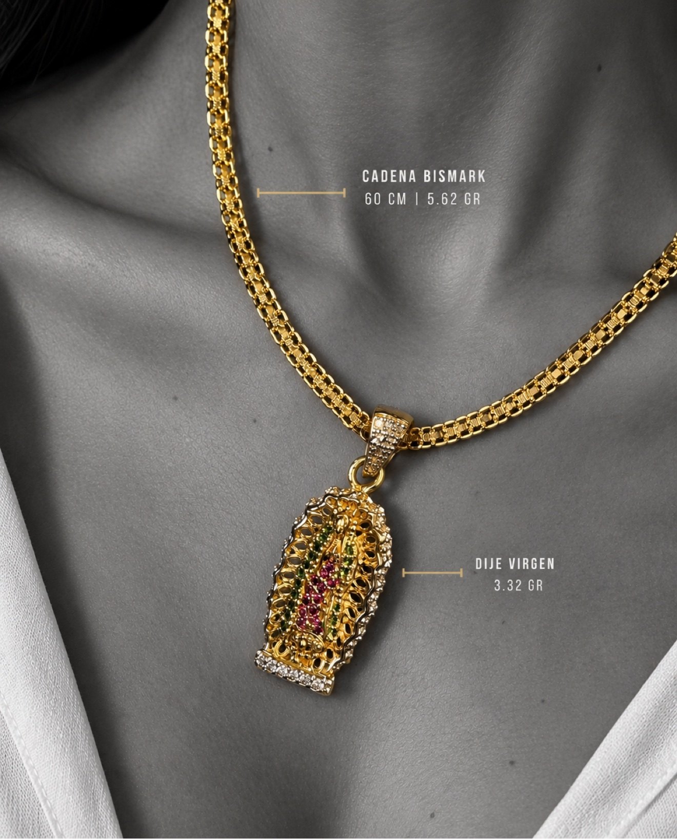 Detalle de la cadena Bismark de 60 cm y 5,62 gramos con el dije de la Virgen de 3,32 gramos en oro 18K, con sus pesos marcados